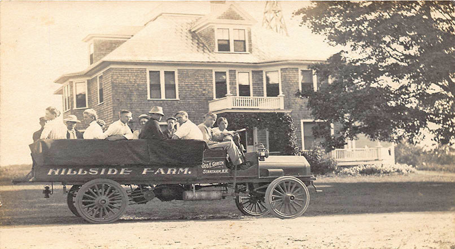 Hillside farm cart full of people